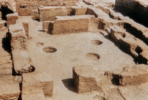 House of the Tiles, Lerna: the west section with storage pits.