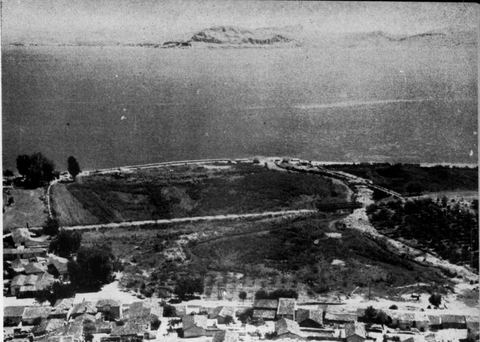 View east from Mt Pontinos over the roofs of Myloi towards the springs and marshes of Lerna, the gulf and Nafplio.