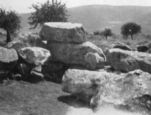 Fig. 24 'Blockhouse Near Lerna, S.E. Corner': wall corner with olive trees and a ridge of hills behind.
