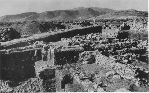 Overview of the Lerna excavation from the north, with hills behind.