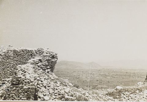 View north from the keep of the Pontinos castle over its masonry towards the Argos plain and mountains.