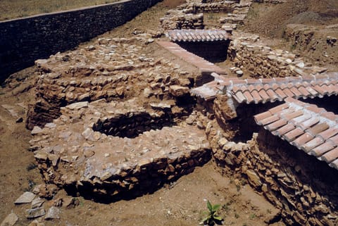 Lerna, 1958: the fortification wall of Lerna III (c. 2500–2200 BC), with protective tile roofs over the excavated walls.