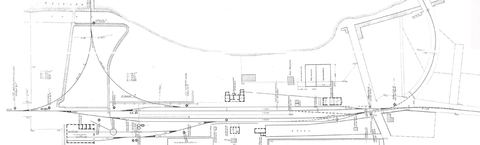 Topographic plan of the whole Myloi station complex from the OSE archive: tracks at km 62–63, the pier with siding and triangle, the engine shed with turntable/water point, coal store, station buildings, garden, signals and points.